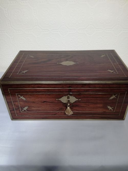 Regency Rosewood Campaign Writing Slope.
secret Drawers.