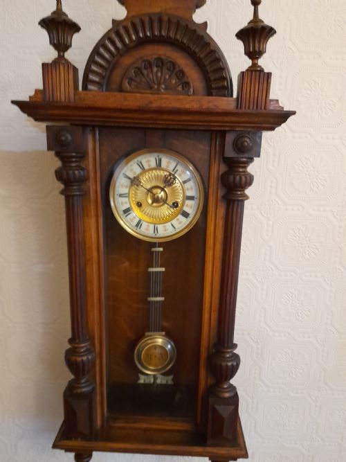A Delightful, Striking Wall Clock of Small Proportions
