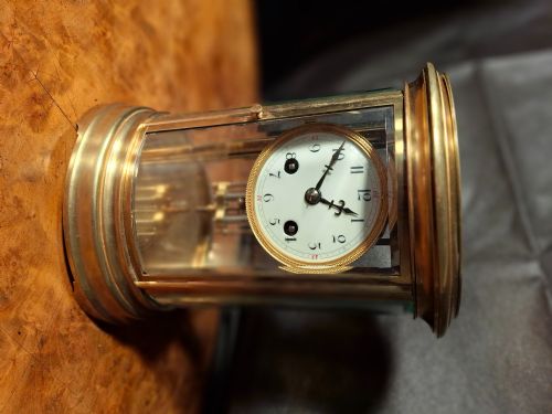 Oval 4-Glass-sided  Mantle/table Clock