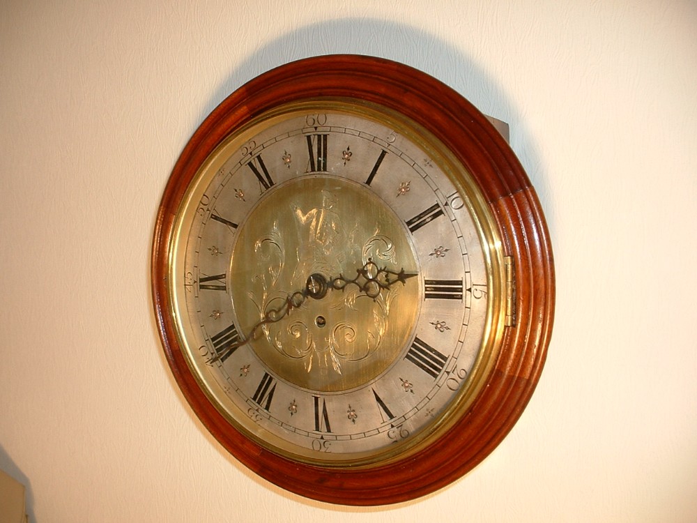 Brass Faced Wall Clock.