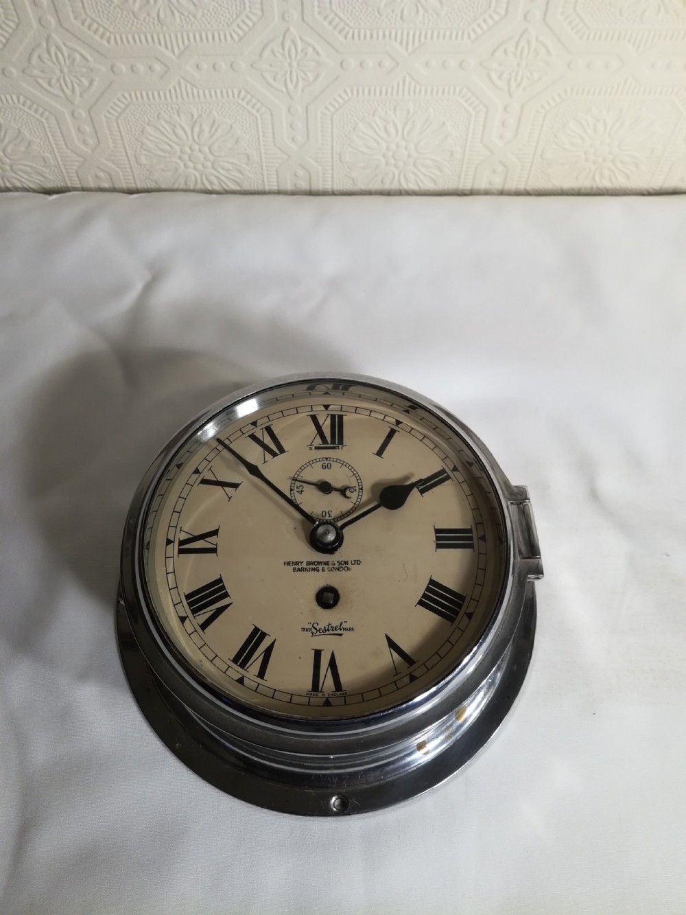 SHIP'S BULKHEAD CLOCK. Henry Browne & Son. London