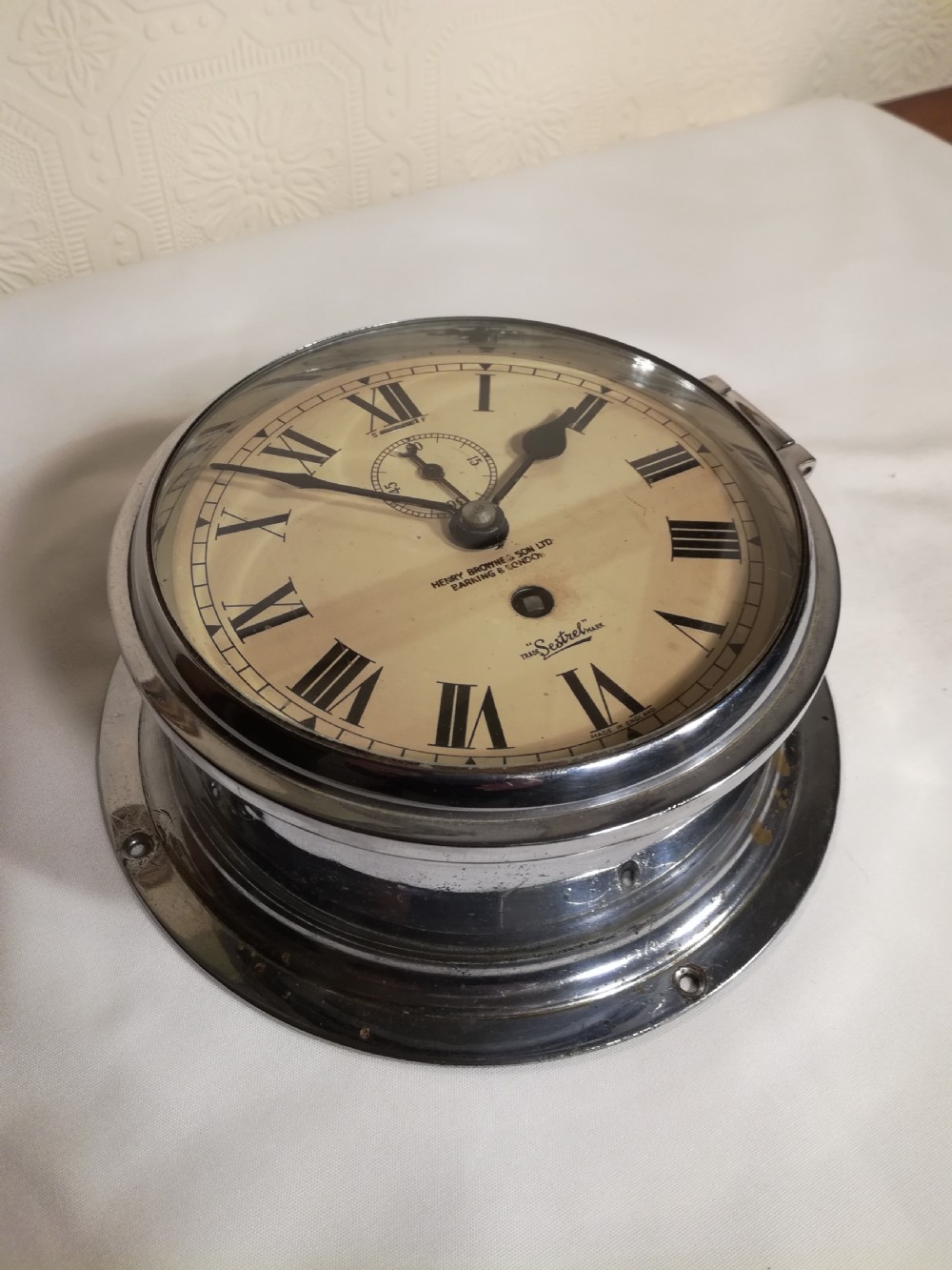 SHIP'S BULKHEAD CLOCK. Henry Browne & Son. London View II