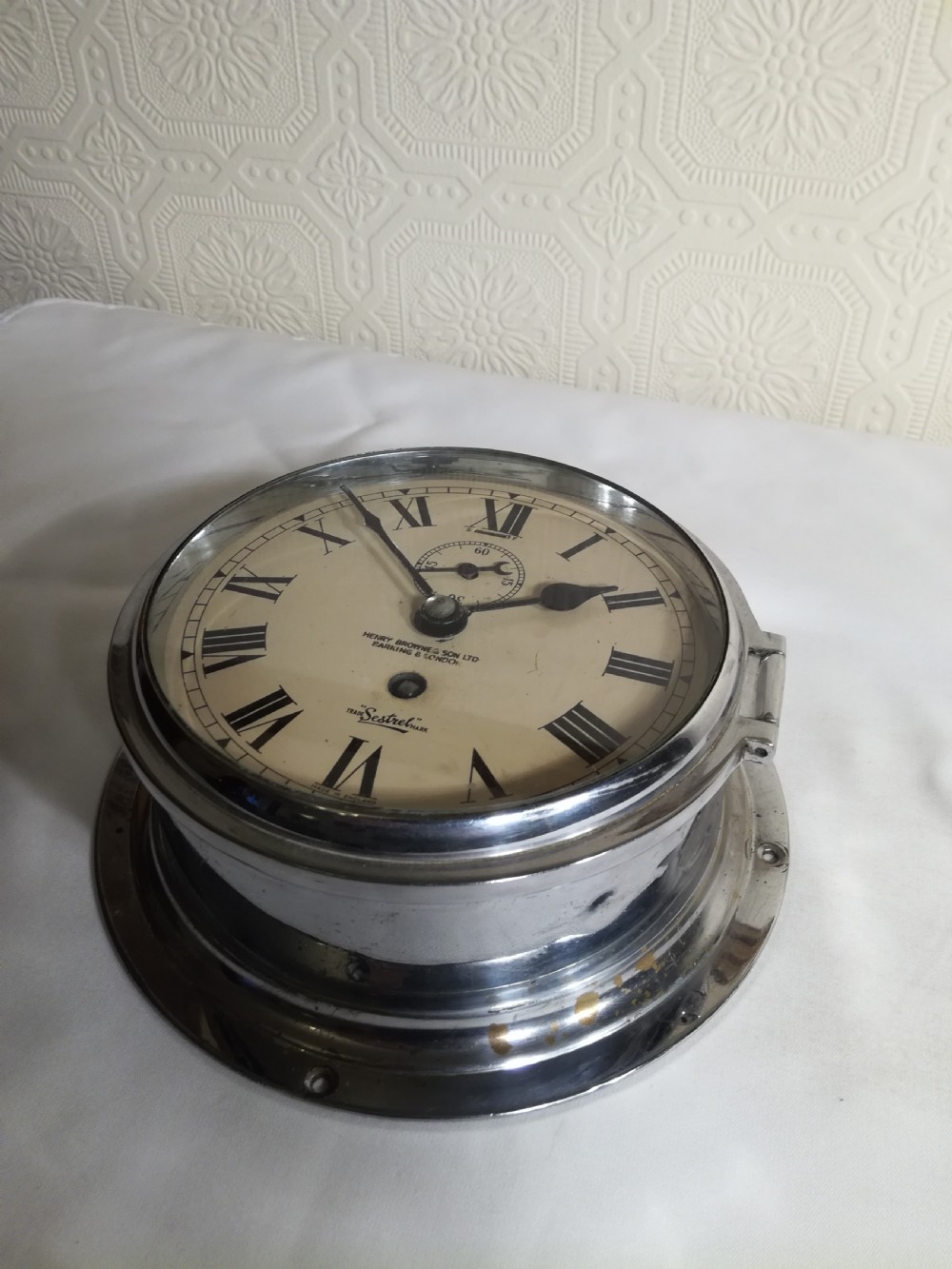 SHIP'S BULKHEAD CLOCK. Henry Browne & Son. London View III
