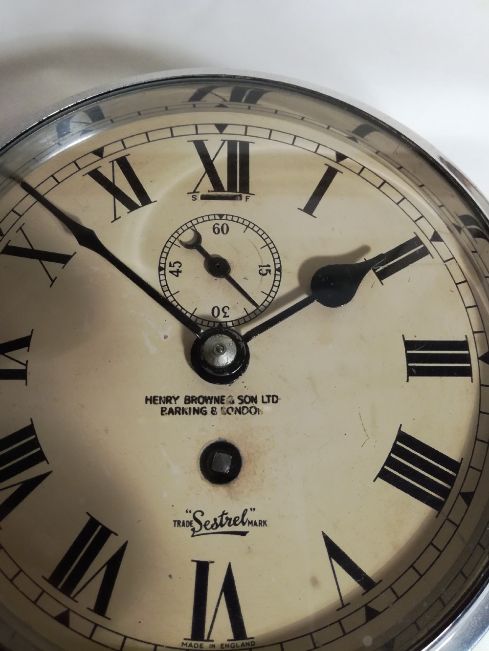 SHIP'S BULKHEAD CLOCK. Henry Browne & Son. London View IV
