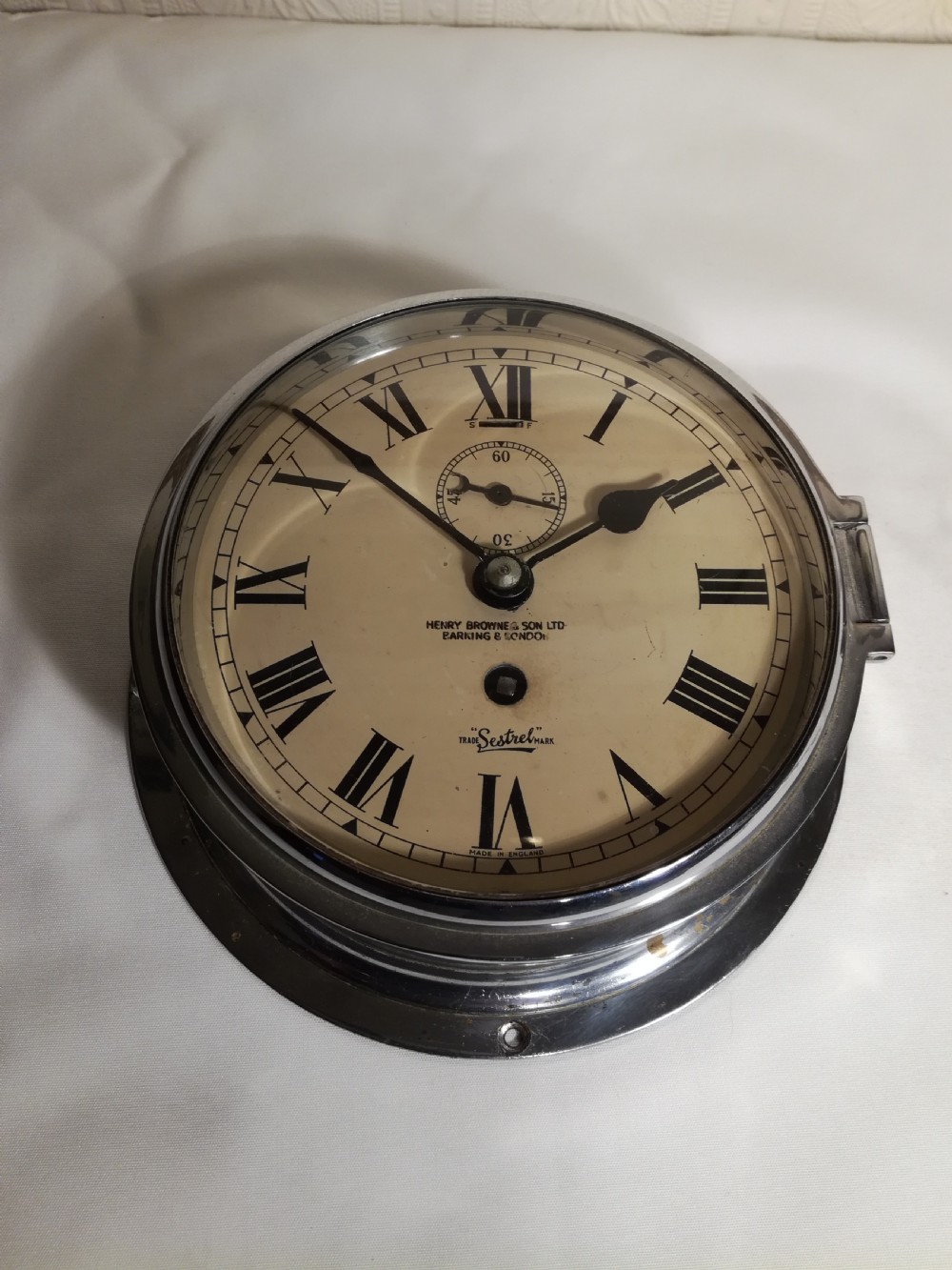 SHIP'S BULKHEAD CLOCK. Henry Browne & Son. London View V