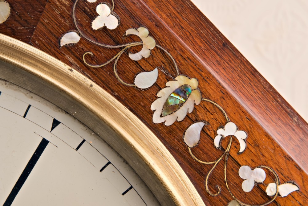 Victorian octagonal drop-dial wall clock crafted in rosewood with intricate mother-of-pearl floral inlay and a white Roman numeral dial. View III