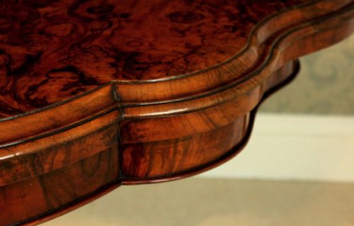 A LATE VICTORIAN BURR WALNUT SERPENTINE SHAPE CARD TABLE - ADDITIONAL PHOTO 5