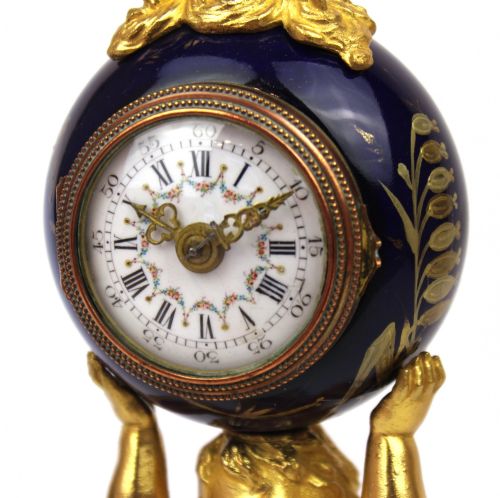 A 19TH CENTURY CHERUB MANTEL CLOCK - ADDITIONAL PHOTO 2