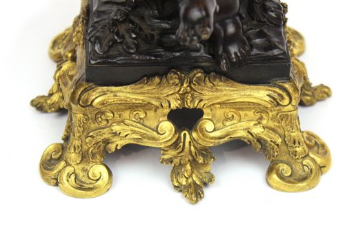 A PAIR OF 19TH CENTURY BRONZE CHERUBS - ADDITIONAL PHOTO 1