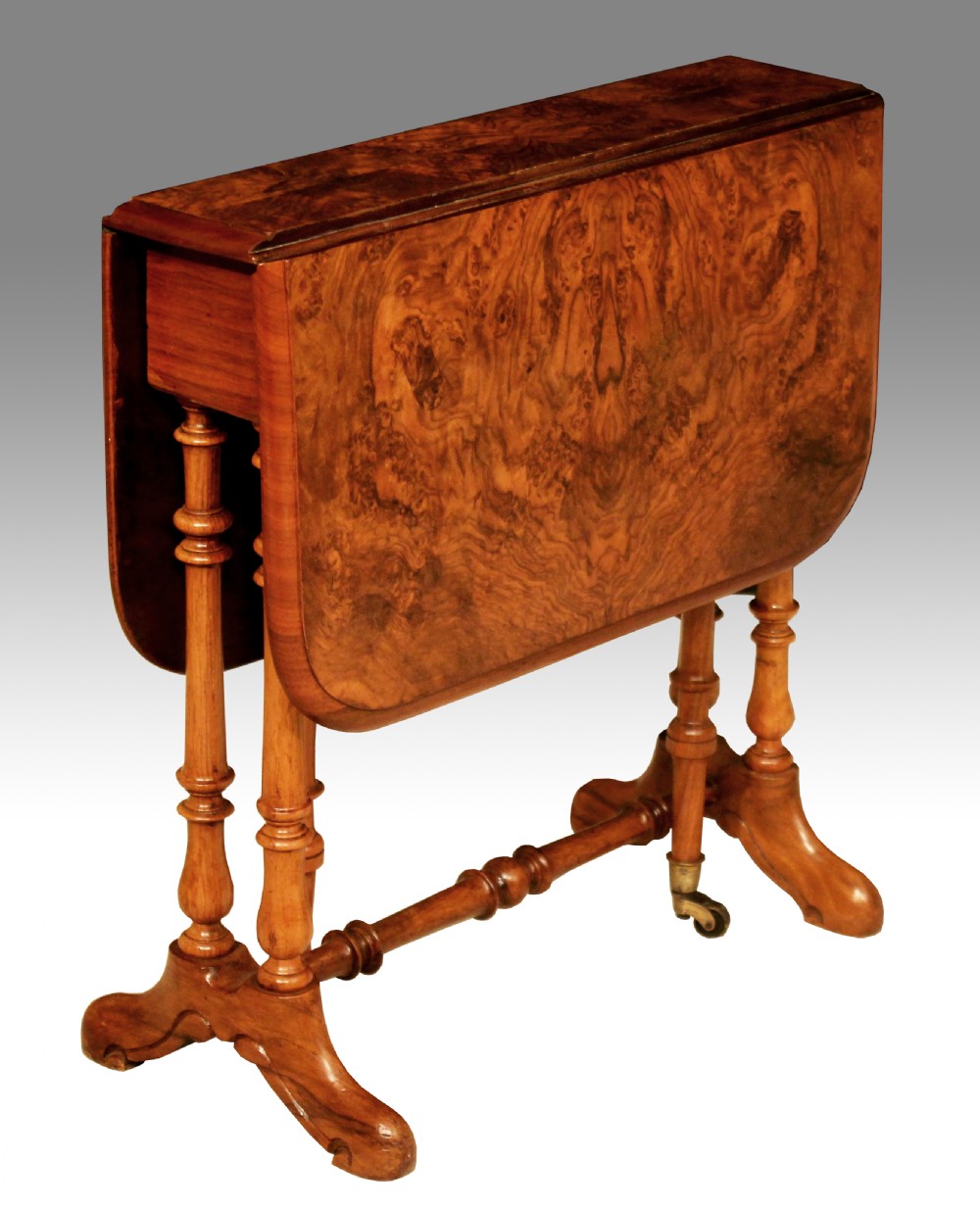 A Superb Victorian Burr Walnut D-Ended Baby Sutherland Table