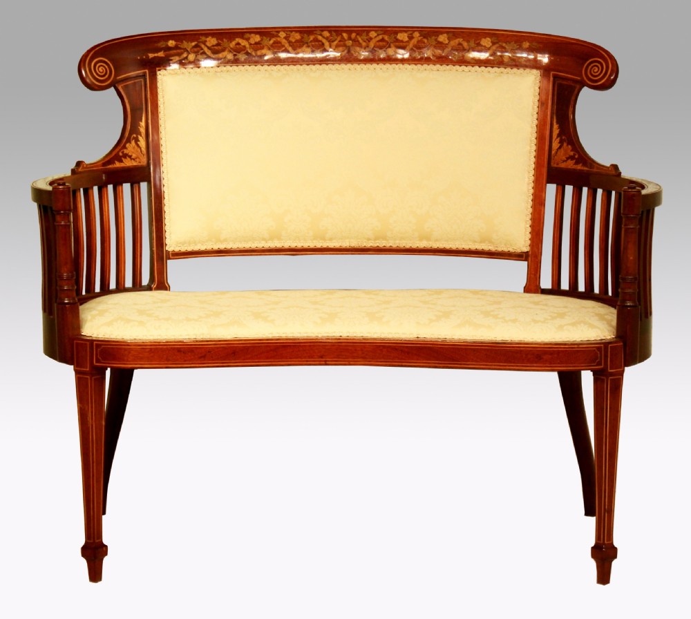 An Exquisite Late Victorian Mahogany Inlaid Upholstered Settee