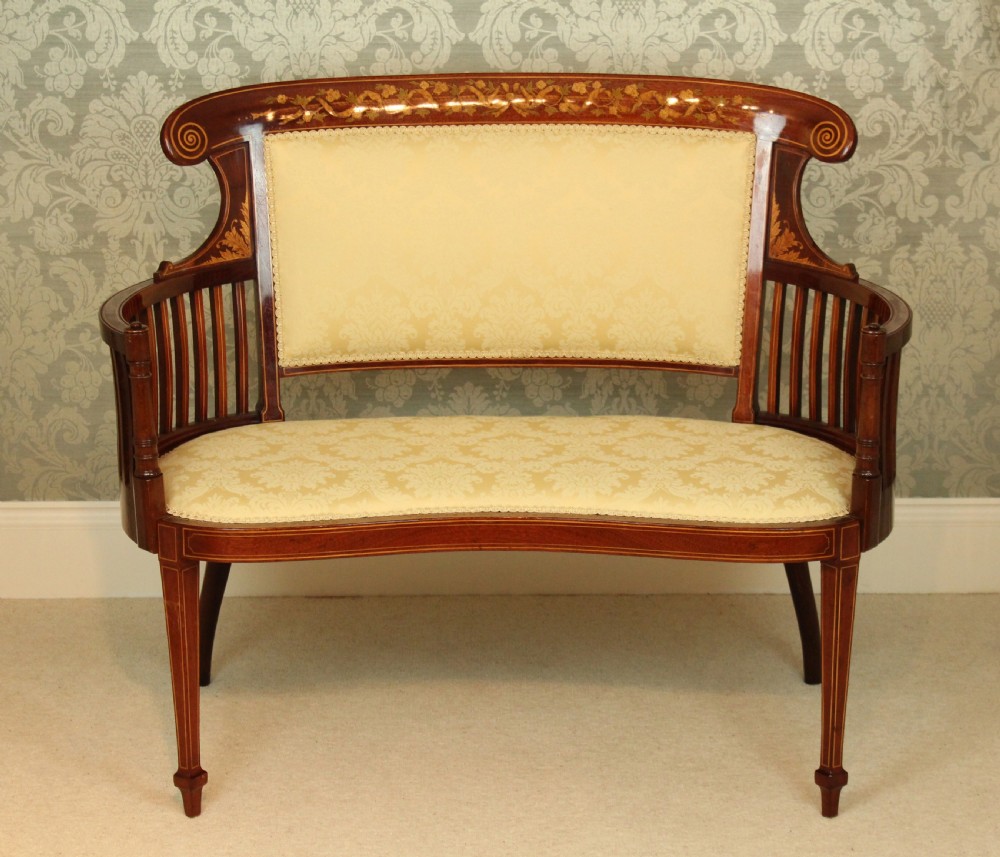 An Exquisite Late Victorian Mahogany Inlaid Upholstered Settee View III