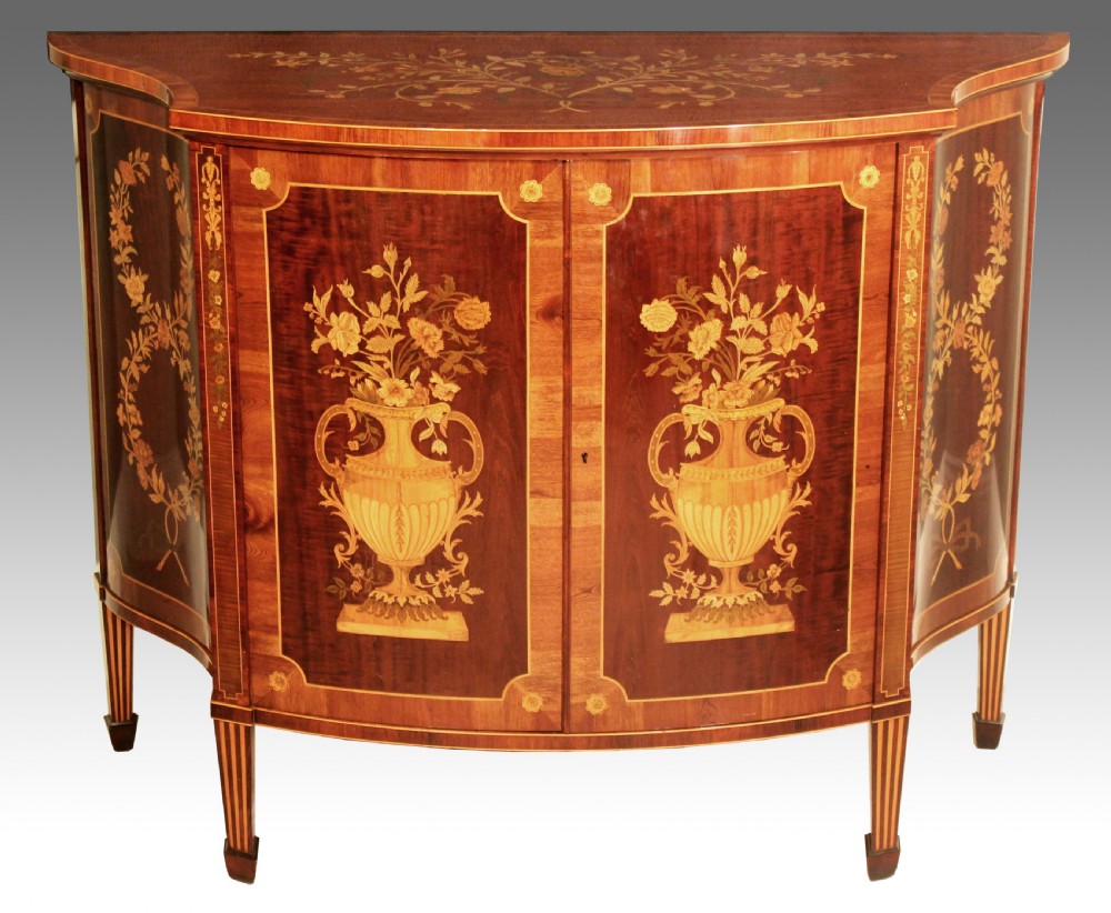 A Superb Late Victorian Mahogany Inlaid Serpentine Commode By Edwards & Roberts