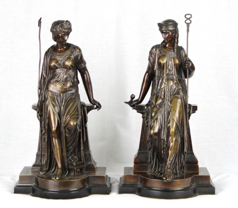 A fine pair of 19th Century Egyptian style bronze maidens by Eutrope Bouret (France, 1833 - 1906)