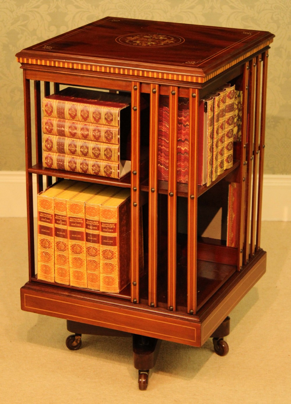 An Exquisite Late Victorian Mahogany inlaid revolving bookcase by Maple & Co. View II