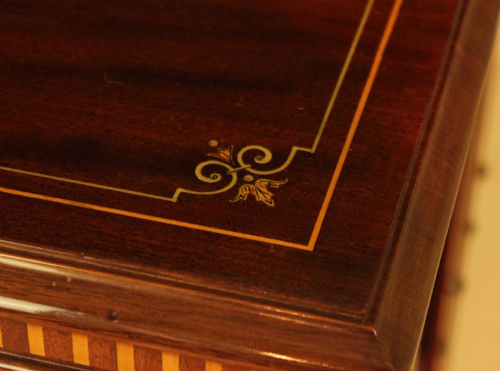 An Exquisite Late Victorian Mahogany inlaid revolving bookcase by Maple & Co. View III