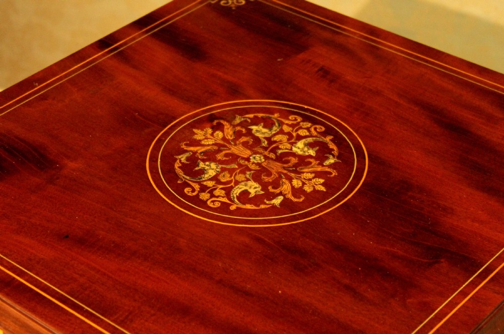 An Exquisite Late Victorian Mahogany inlaid revolving bookcase by Maple & Co. View IV