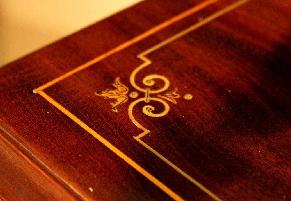 An Exquisite Late Victorian Mahogany inlaid revolving bookcase by Maple & Co. View VI