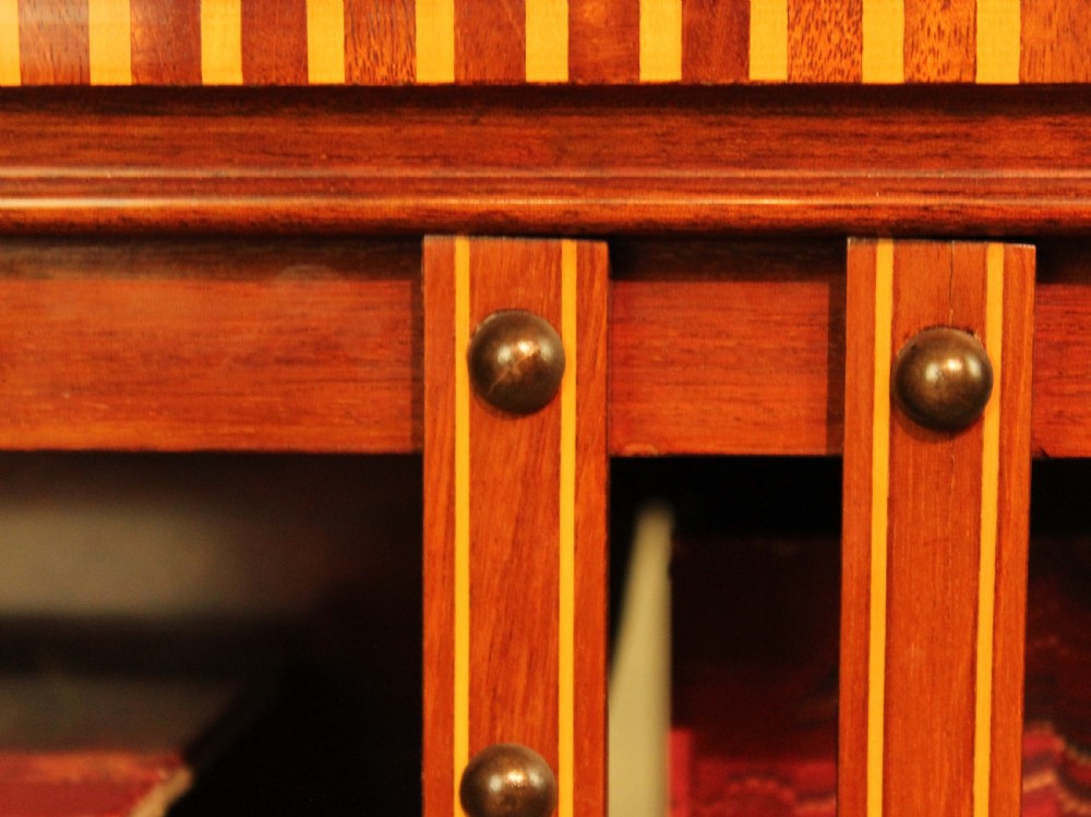 An Exquisite Late Victorian Mahogany inlaid revolving bookcase by Maple & Co. View VII