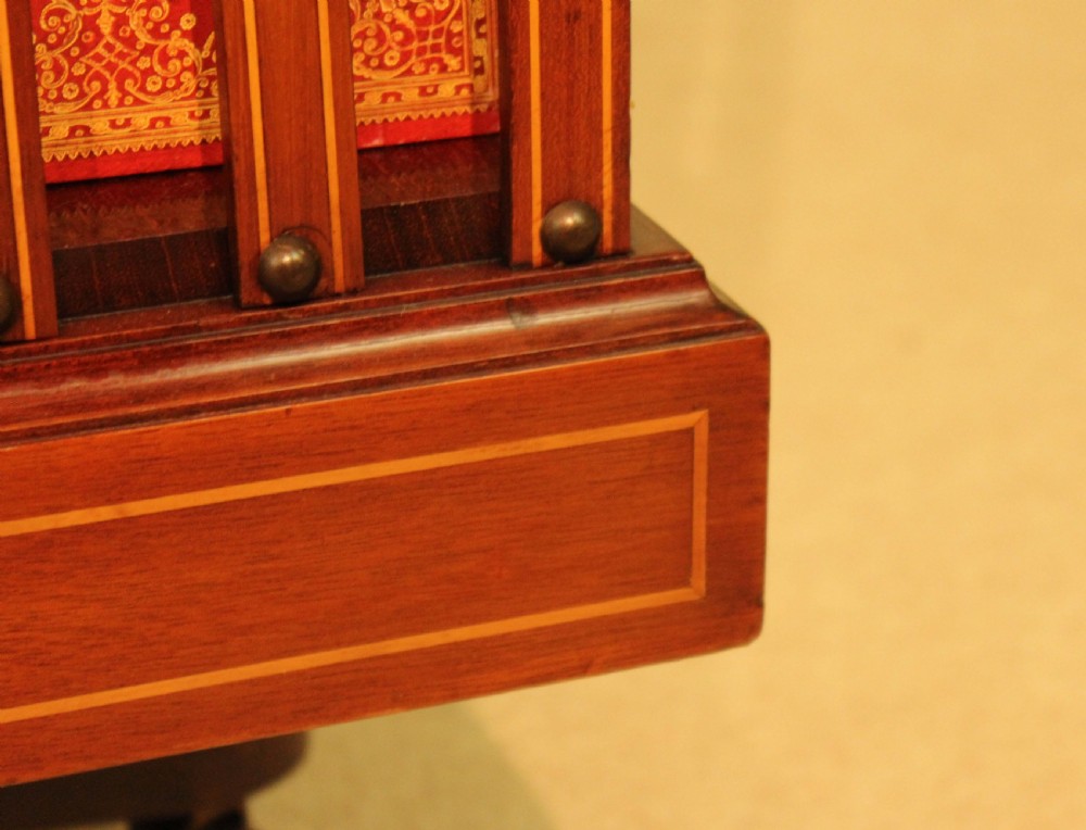An Exquisite Late Victorian Mahogany inlaid revolving bookcase by Maple & Co. View X