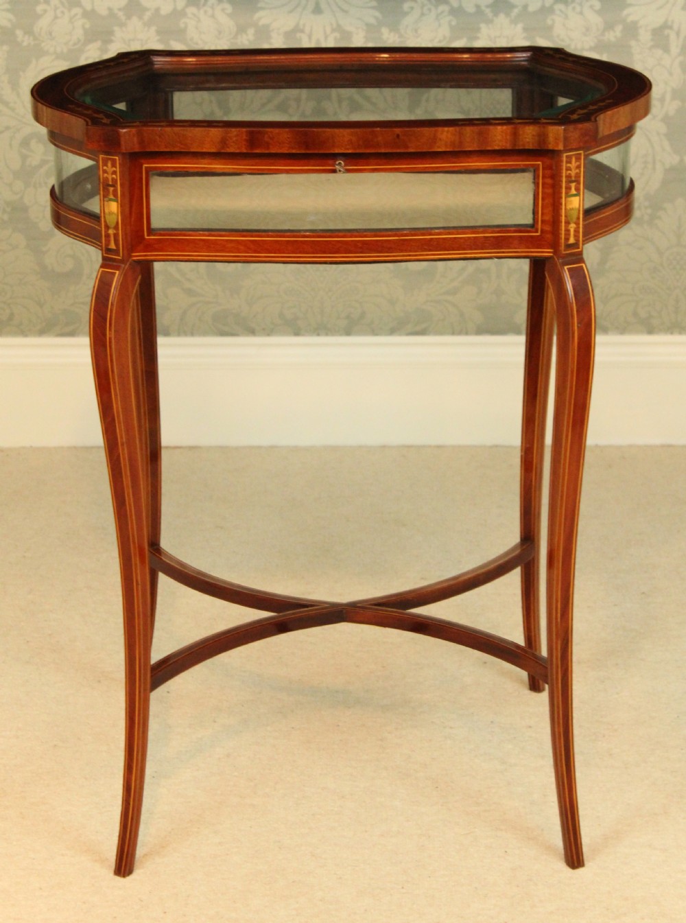 A Fine quality late Victorian mahogany inlaid serpentine shaped bijouterie table View II