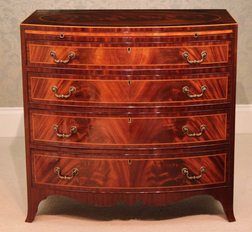 The Quality Edwardian Mahogany inlaid bow fronted chest View II
