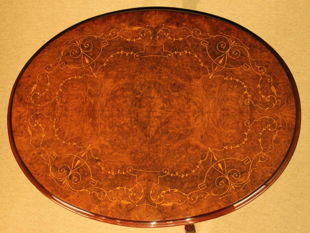 A Fine Quality Victorian Burr-Walnut Inlaid Oval Tripod Table View III