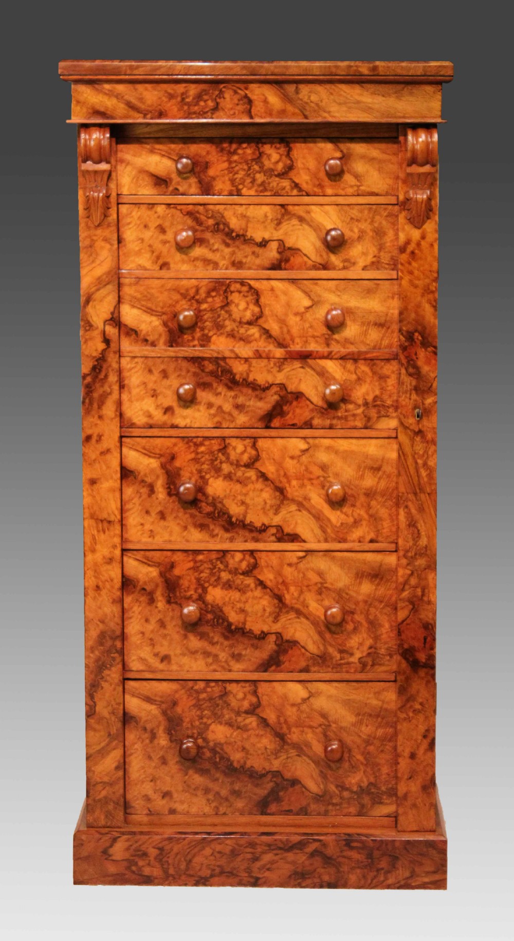 A Fine Quality Victorian Figured Burr Walnut Secretaire Wellington Chest.