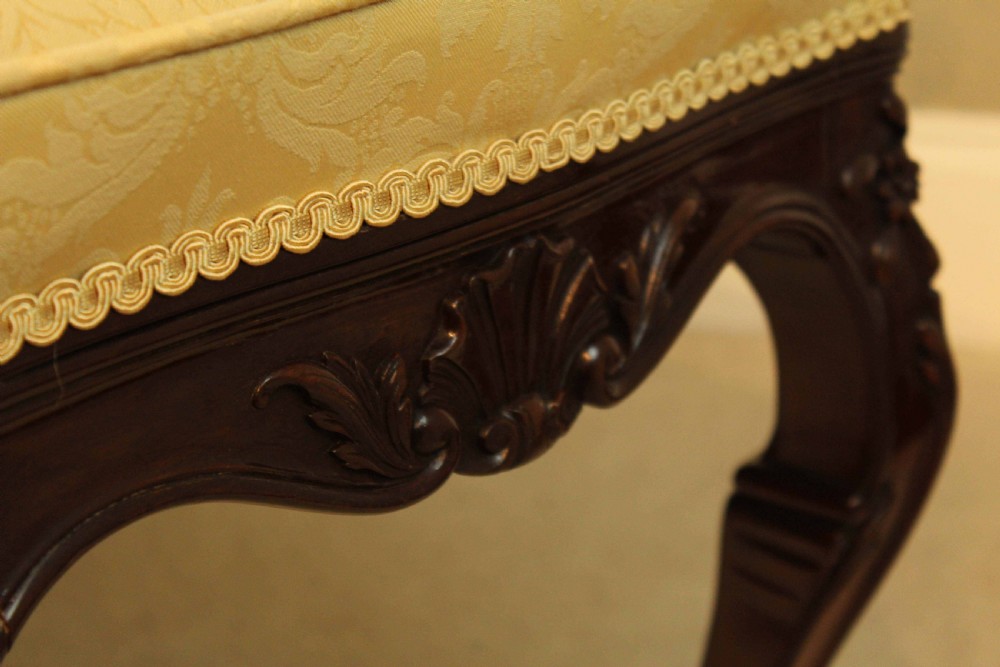 A mahogany Late Victorian Period stool by Edwards & Roberts of London. View IV