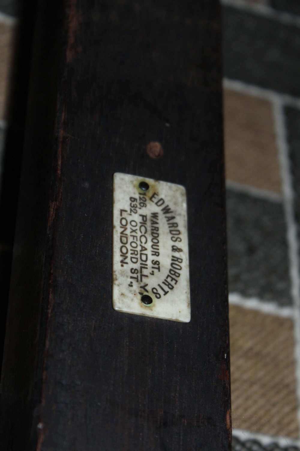 A mahogany Late Victorian Period stool by Edwards & Roberts of London. View VII