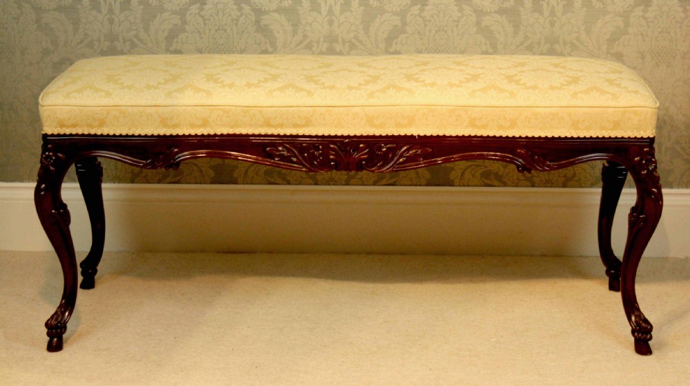 A mahogany Late Victorian Period stool by Edwards & Roberts of London. View VIII