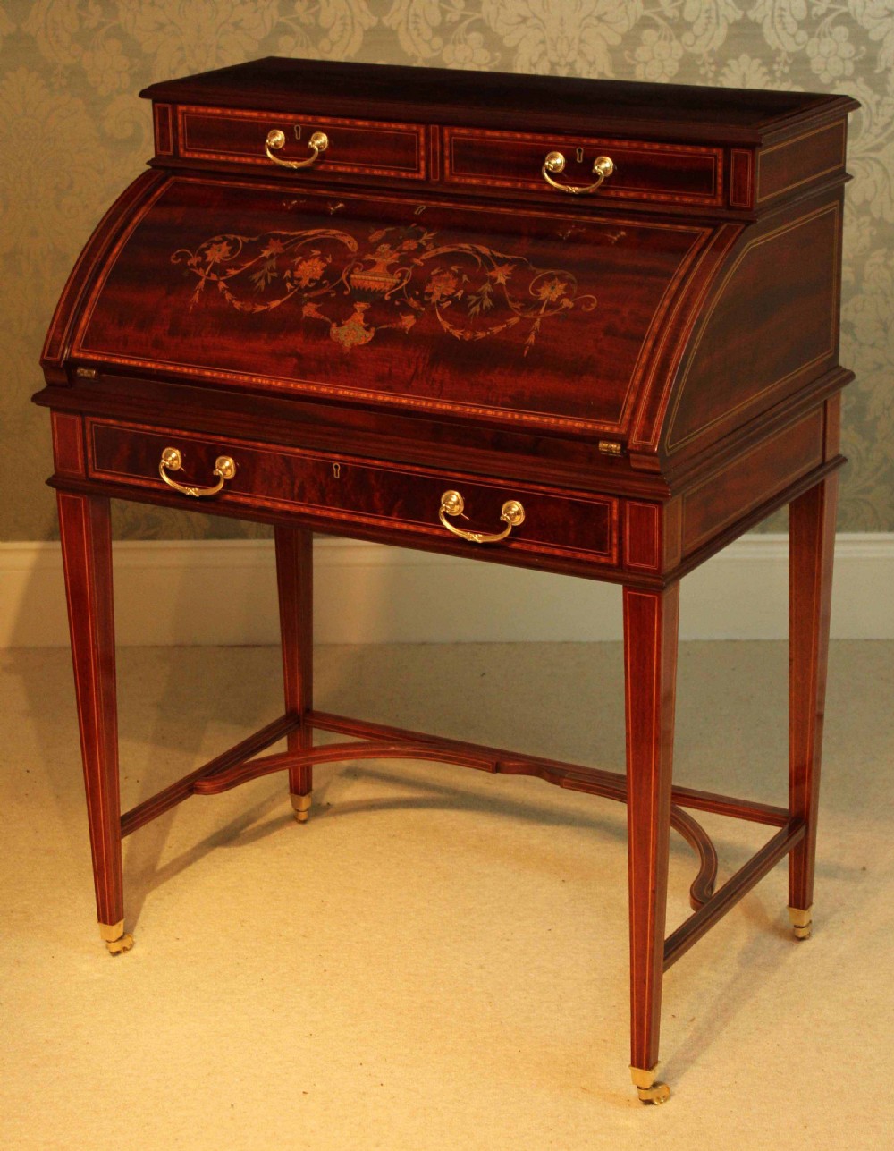 A Beautiful Late Victorian Mahogany cylinder desk by Maple & Co. View II