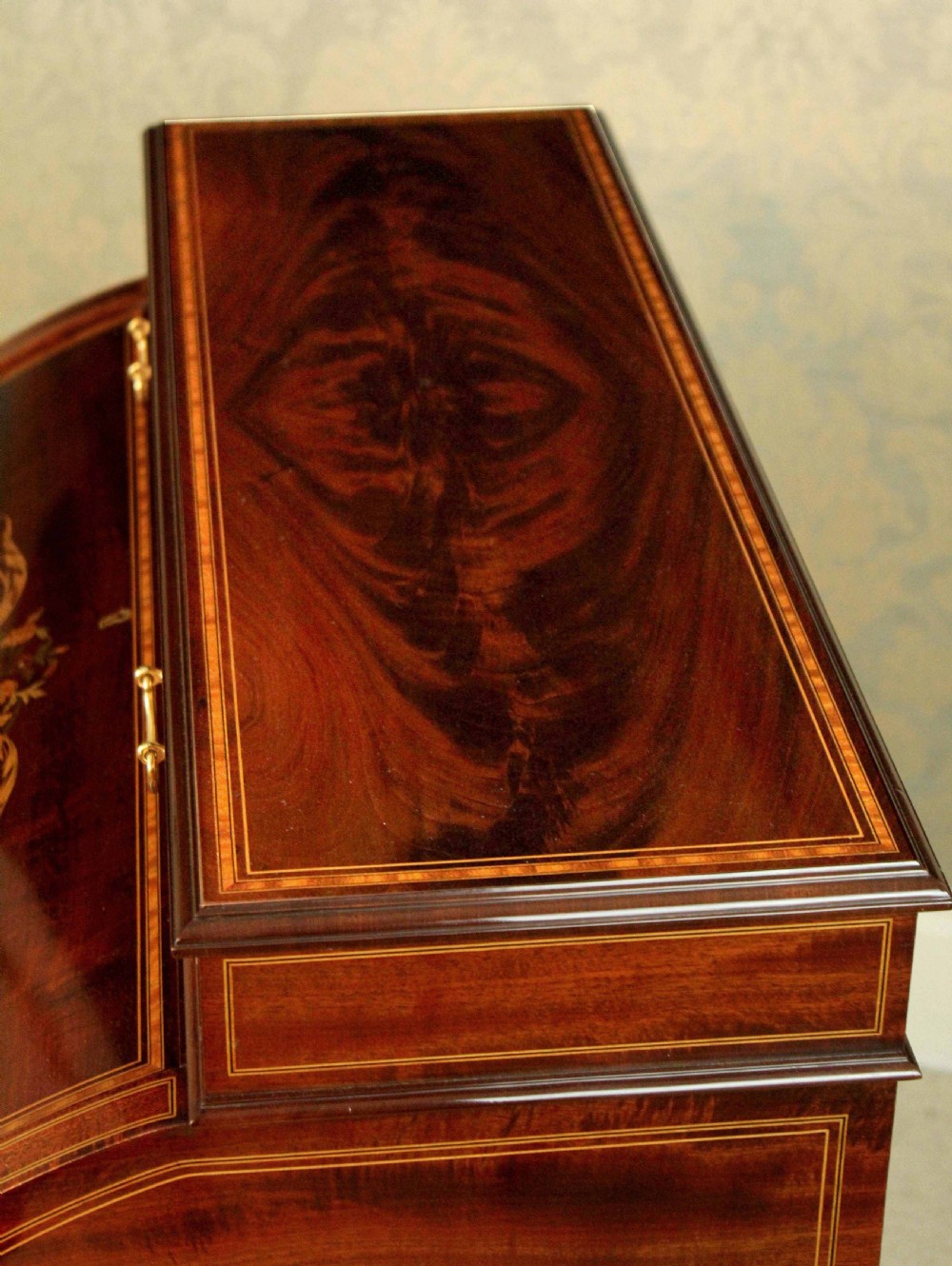 A Beautiful Late Victorian Mahogany cylinder desk by Maple & Co. View III