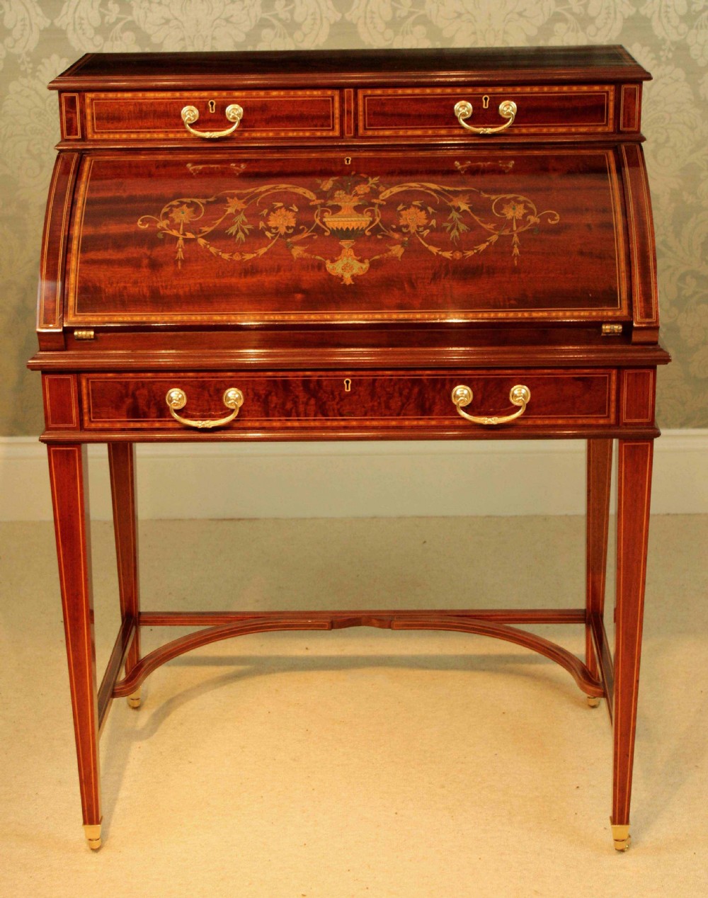 A Beautiful Late Victorian Mahogany cylinder desk by Maple & Co. View XIX