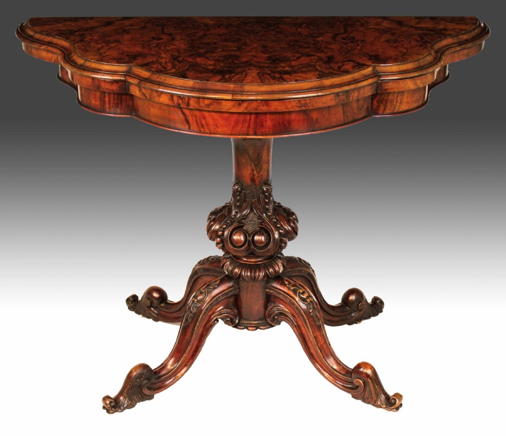A Late Victorian Burr Walnut Serpentine Shape Card Table