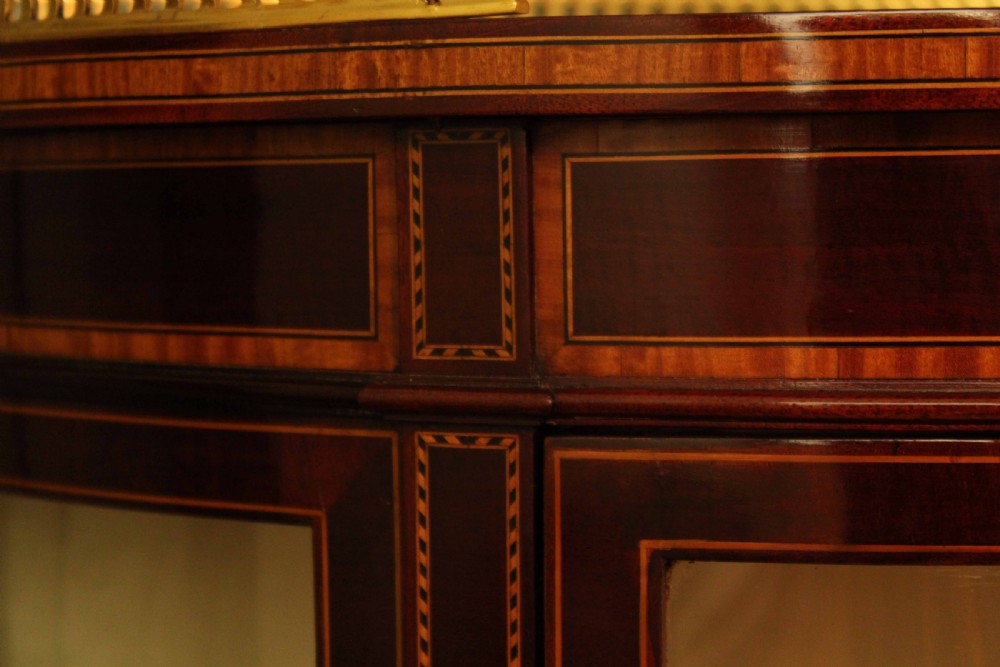 A Fine Quality Pair of Edwardian Inlaid Bow-front Glazed Display Cabinets View III