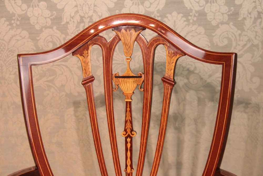 A Fine Pair of Late Victorian Mahogany inlaid shield back ladies and gents armchairs by Edwards & Roberts. View III