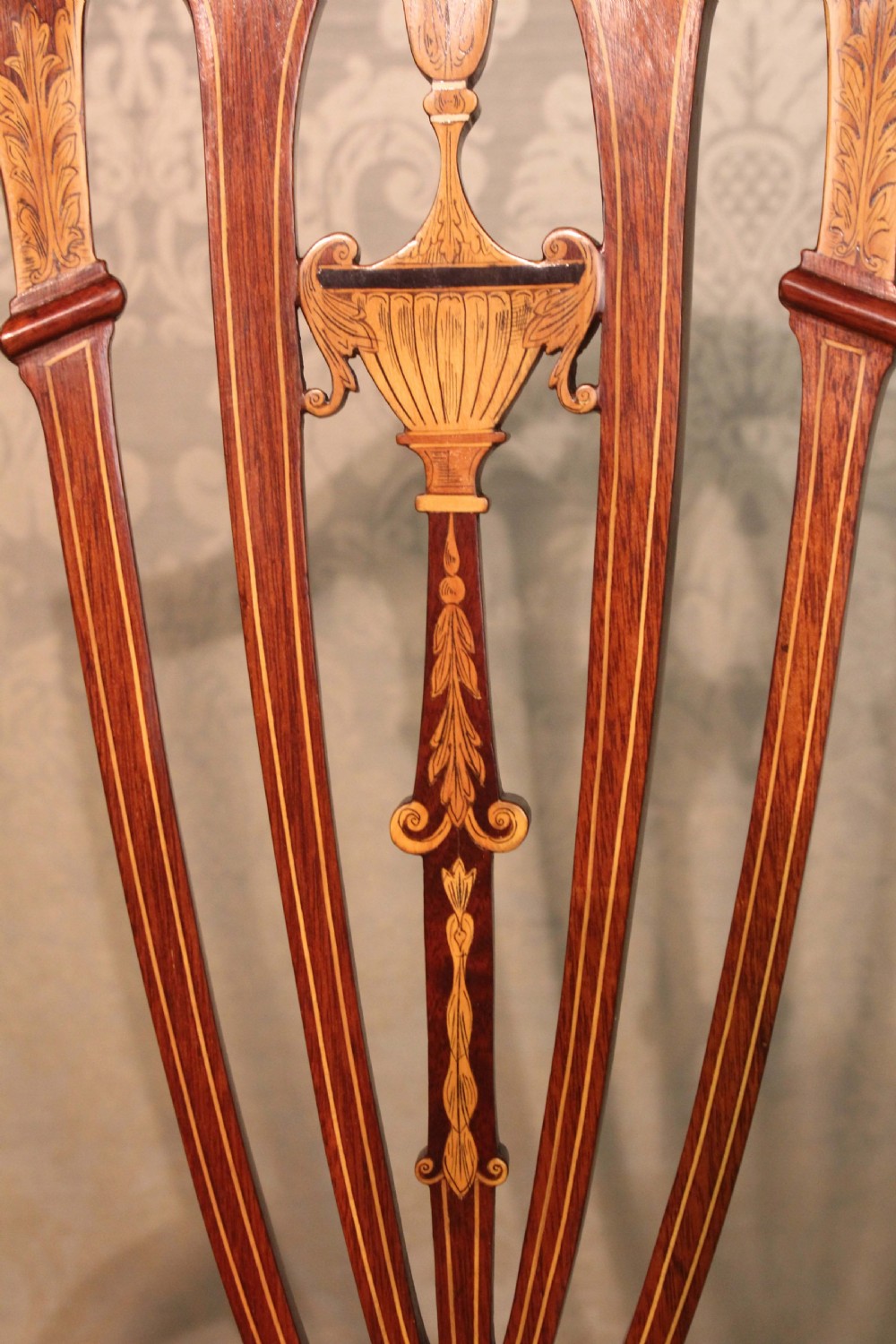 A Fine Pair of Late Victorian Mahogany inlaid shield back ladies and gents armchairs by Edwards & Roberts. View IX