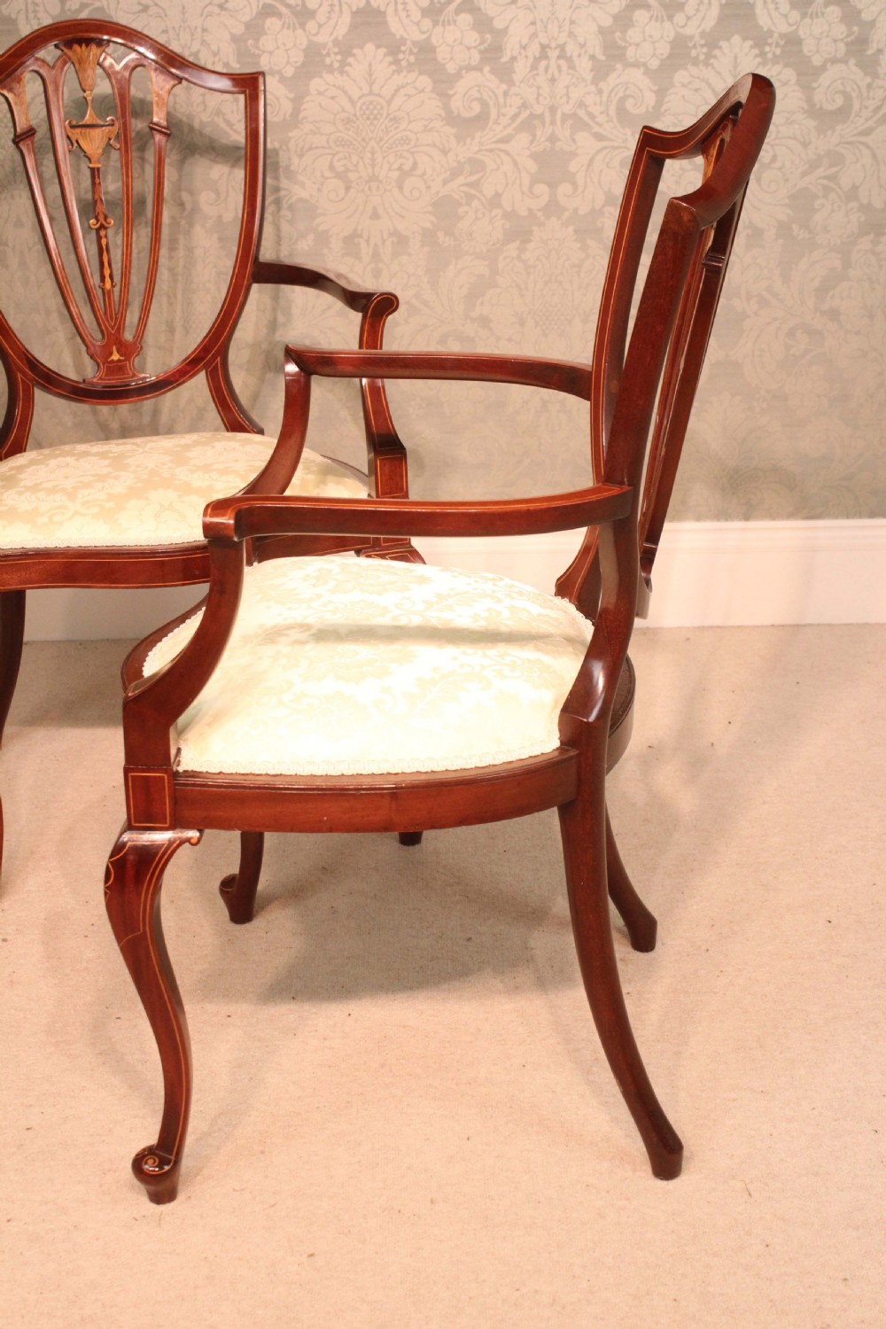A Fine Pair of Late Victorian Mahogany inlaid shield back ladies and gents armchairs by Edwards & Roberts. View X