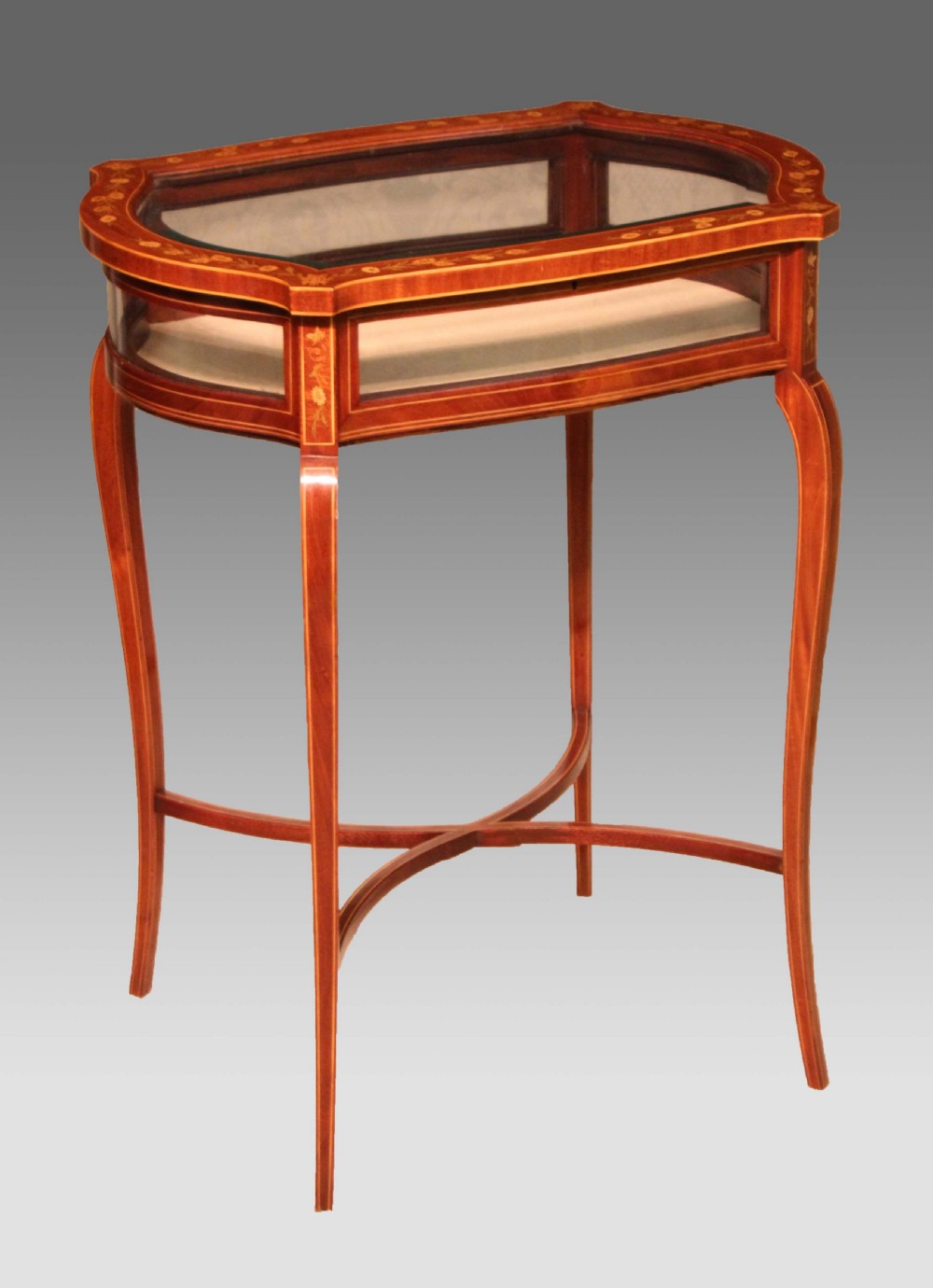 A Fine Quality Late Victorian Mahogany Inlaid Serpentine Shaped Bijouterie Table