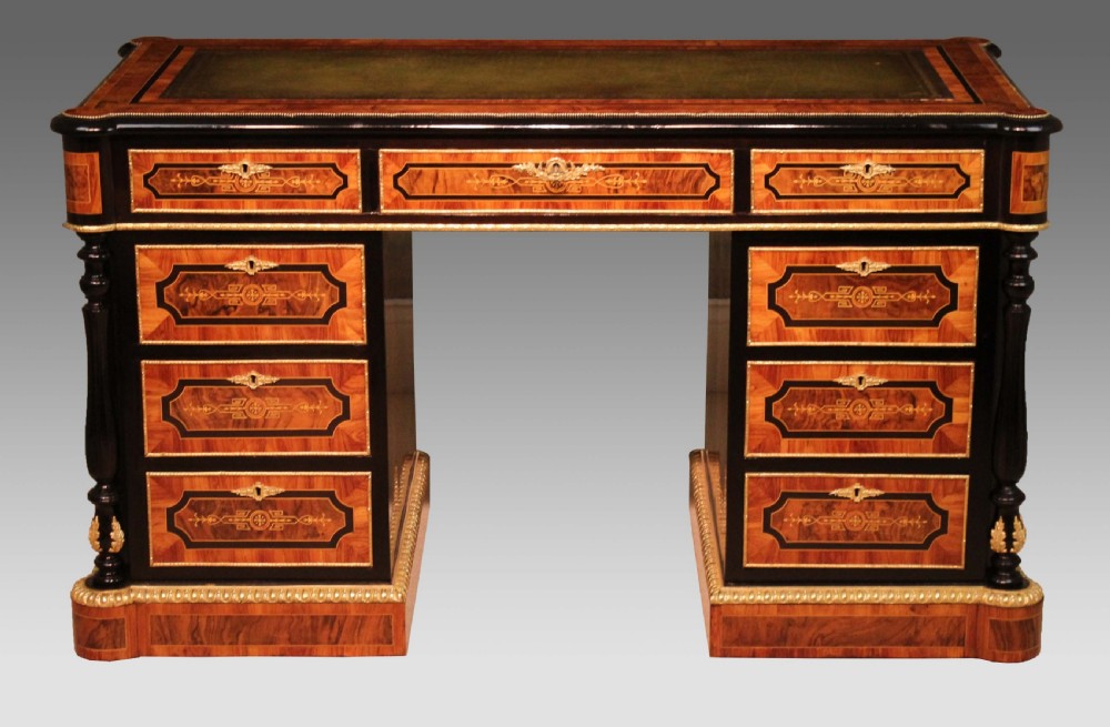 An Exceptional Exhibition Quality inlaid Partners Desk in the style of Holland and Sons.