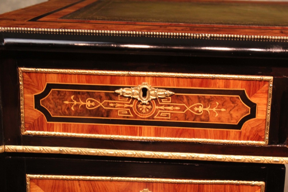 An Exceptional Exhibition Quality inlaid Partners Desk in the style of Holland and Sons. View XV
