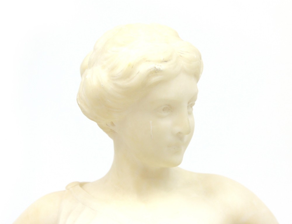 A 19th Century Marble sculpture modelled as a seated Maiden View III