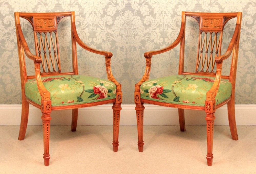 An Elegant Pair Of Painted And Carved Satinwood Side Chairs