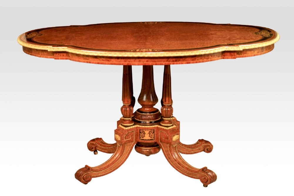 A Gillows Victorian Burr-walnut And Amboyna Mounted Centre Table