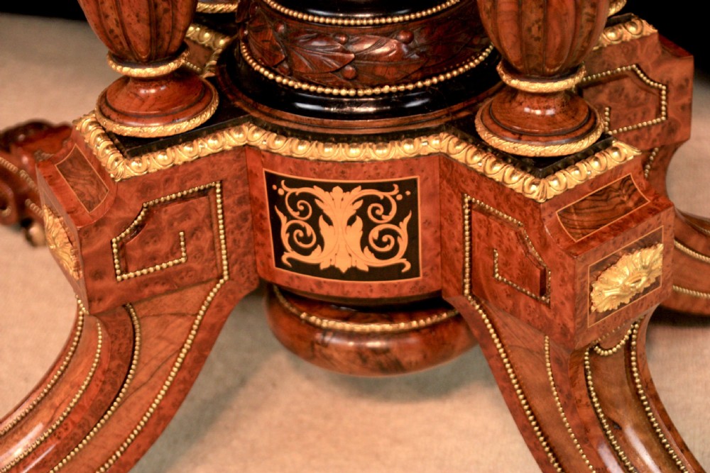 A Gillows Victorian Burr-walnut And Amboyna Mounted Centre Table View II