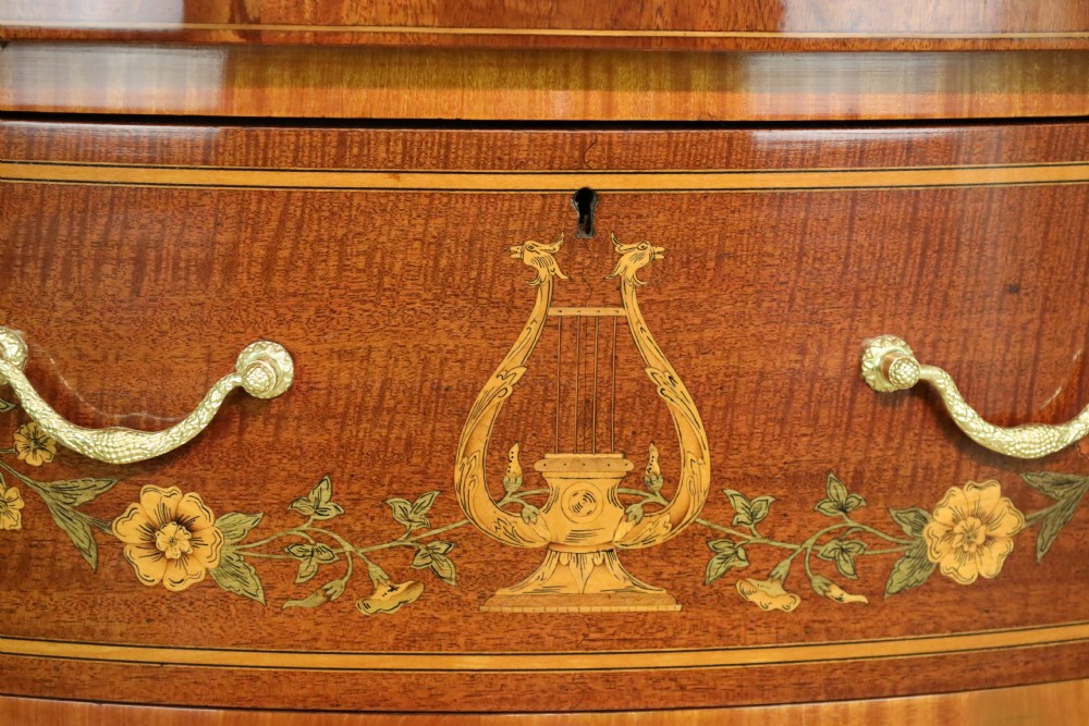 A Superb Late Victorian Mahogany Inlaid Serpentine Commode View II