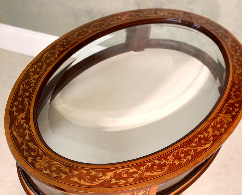 An Edwards & Roberts Victorian Mahogany Inlaid Oval Bijouterie Table View VII