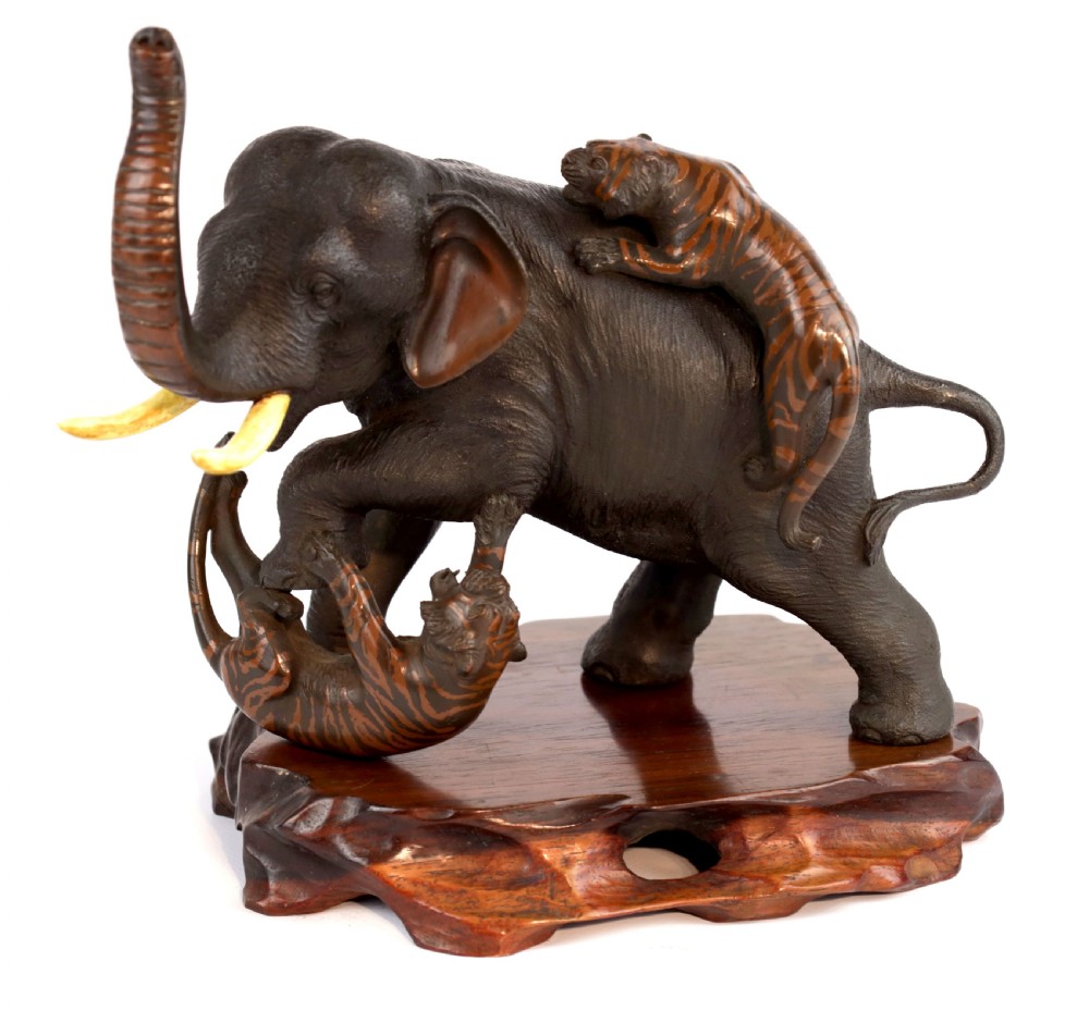 A Japanese Meiji Period Bronze of Tigers and Elephant