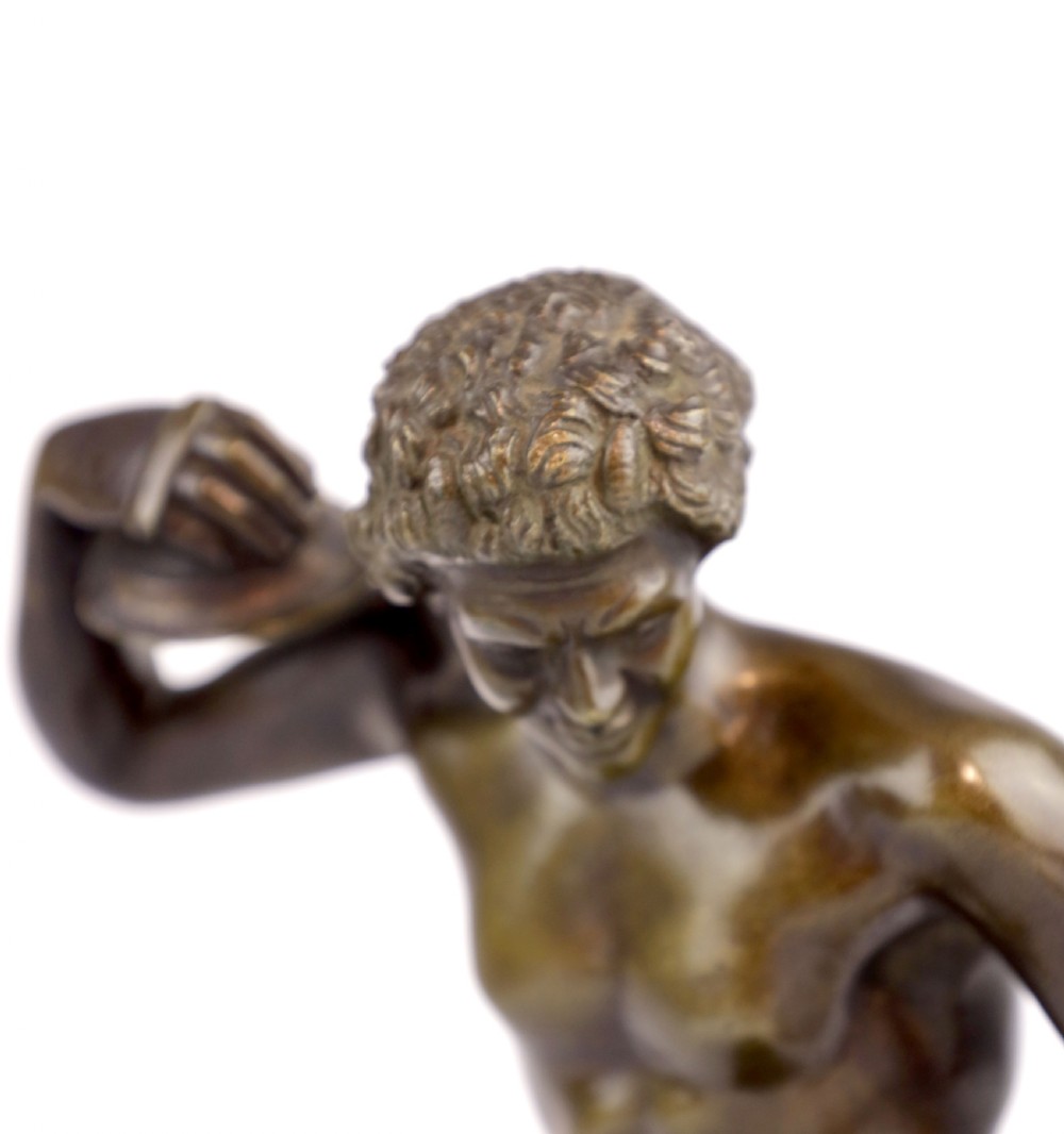 A 19th Century Grand Tour Bronze Of A Dancing Faun Holding Cymbals View II